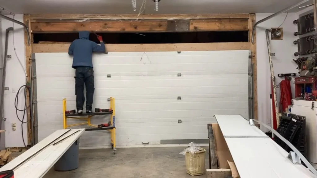 Enlarging garage door opening