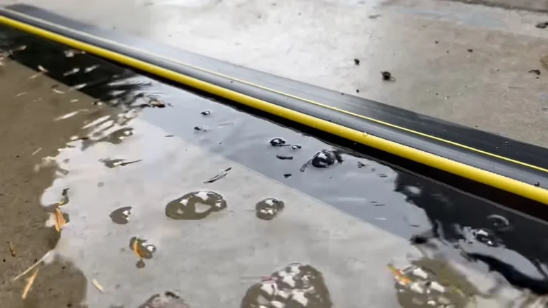 water coming under garage door