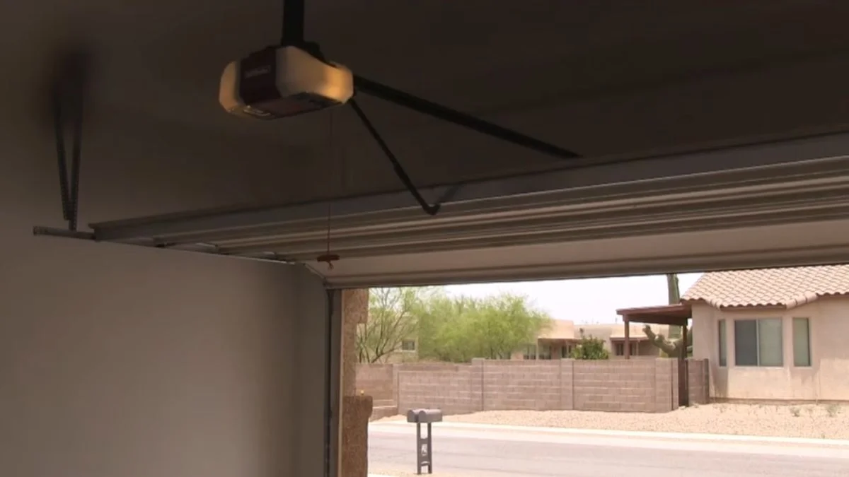 garage door beeping and light flashing