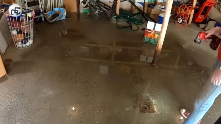 garage drain clogged with sand