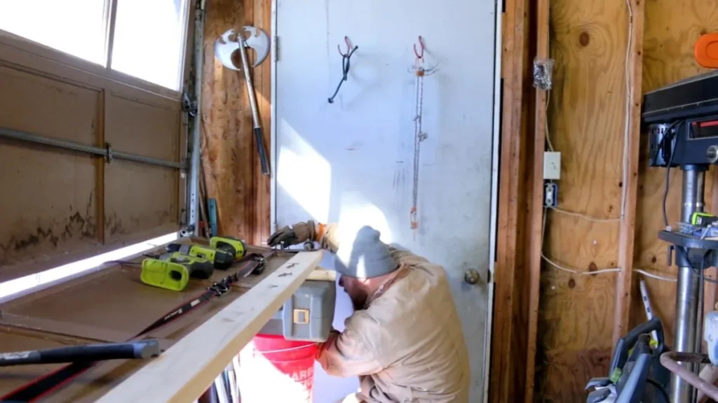 repairing wood garage door panel